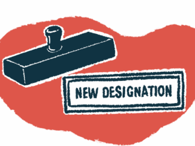 A rubber stamp is seen hovering over the stamped words 'new designation.'