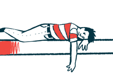 A person lies prone on a surface with one arm hanging down.